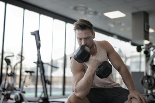 Man lifting dumbbell